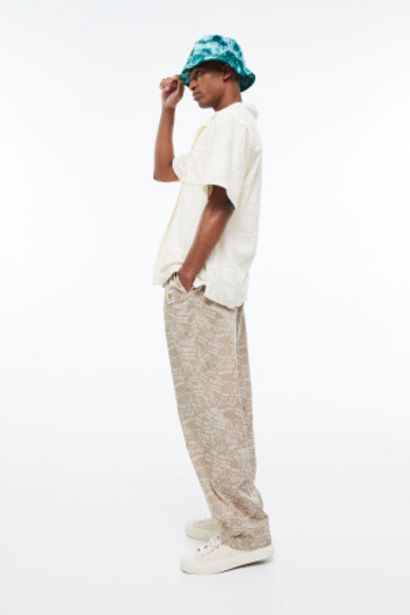 Bawełniane spodnie we wzory Relaxed Fit za 79,99 zł w H&M