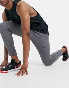 Nike Training – Dri-Fit – Ciemnoszare zwężane joggersy polarowe za 100 zł w ASOS
